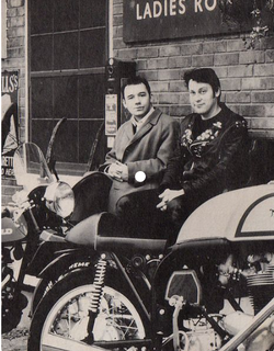 vic & bob on bikes.png