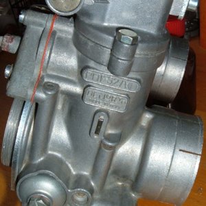 Dellorto carb bodies after cleaning with rotating brass wire brushes