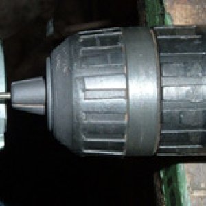 Using a drill to apply Molykote D 321 R onto carb slides